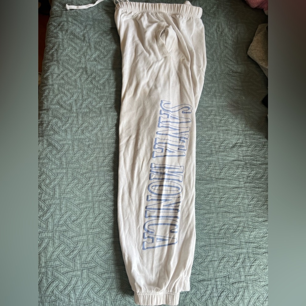 Garage Brand Size:Medium sweatpant Drawstring waist and elastic bands at ankles.